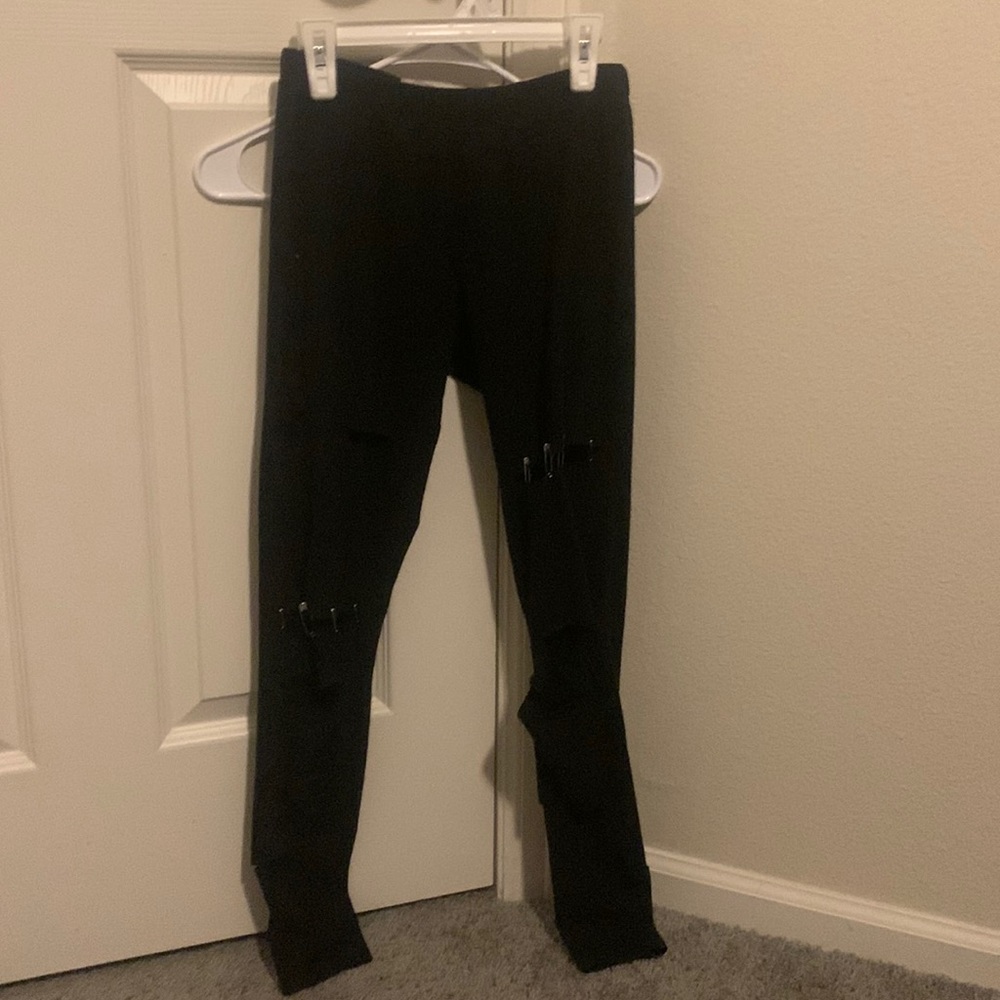 Edgy black ripped leggings.